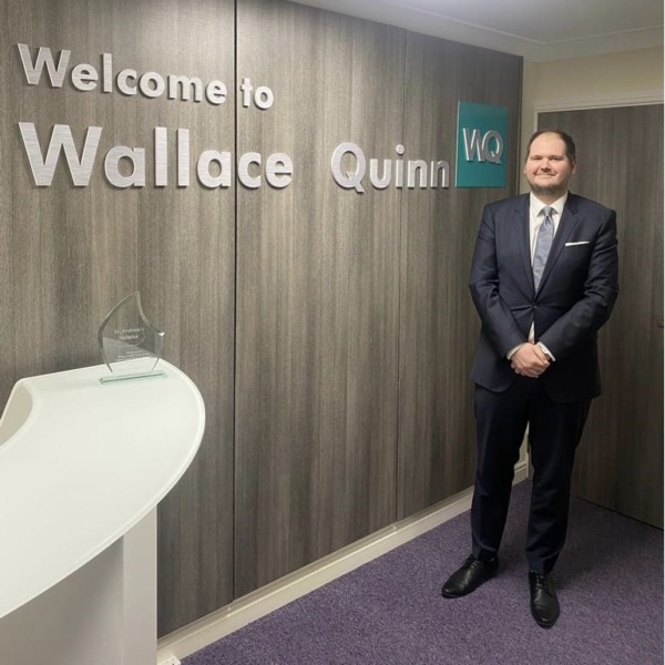 James Higgins in the reception area of Wallace Quinn