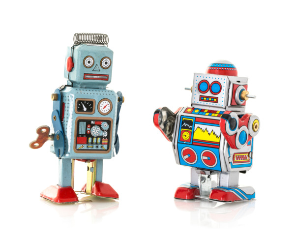Two Retro Tin Robot on a White Background in the article 'valuing assets in a will'