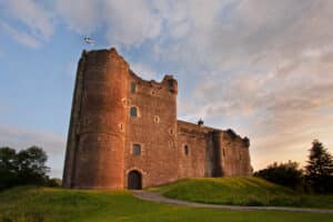 A picture of Doune Castle in the article 'buying a listed building' in Scotland.