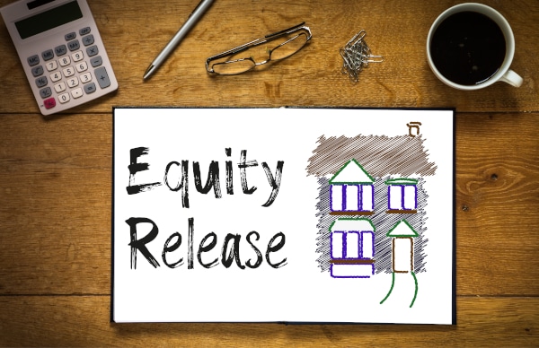 image showing a drawing of a house indicating equity release - but should it be a home reversion plan or lifetime mortgage?