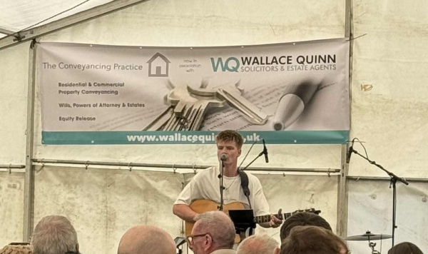 Photo of Fraser McLean performing as Wallace Quinn Sponsors the Bathgate Processon and Community Festival