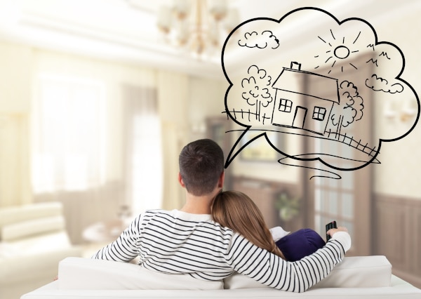 young couple thinking about their dream home and contemplating buying a house in Scotland